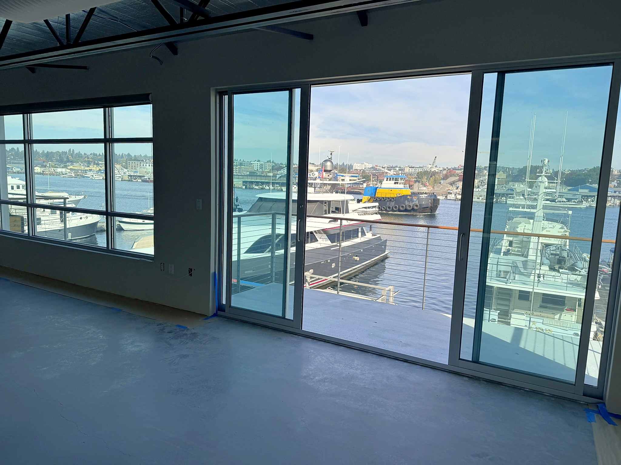 Ship Canal view through the sliding doors of 2292 Suite 200